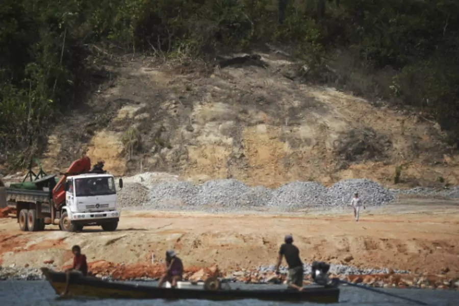 Fishermen approach the Belo Monte hydroelectric dam construction site, during a protest against its construction and its impac... their livelihoods, along the Xingu River near Altamira in Para State on September 25, 2012 (Lunae Parracho/Courtesy Reuters).