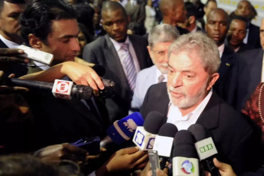 Brazil's President Luiz Inacio Lula da Silva (C) addresses the media during a visit to the future site of an anti-retroviral factory near Mozambique's capital Maputo on November 10, 2010 (Grant Lee Neuenberg/Courtesy Reuters).