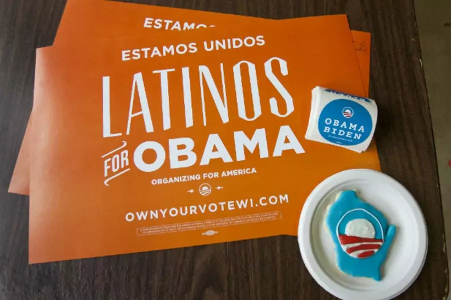 Placards and campaign stickers sit on a table at the Latino regional headquarters for the Obama campaign during election day of the U.S. presidential election in Milwaukee, Wisconsin November 6, 2012.