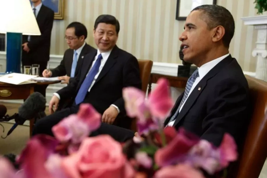 U.S. President Barack Obama (R) shakes hands with China's Vice President Xi Jinping in the Oval Office of the White House in Washington on February 14, 2012. (Jason Reed/Courtesy Reuters)