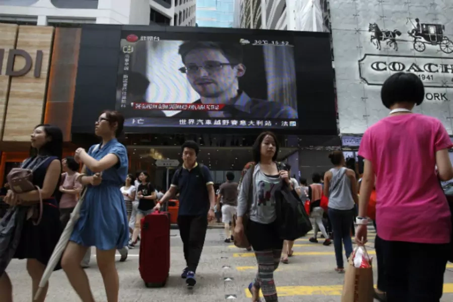 Snowden on news monitor in China