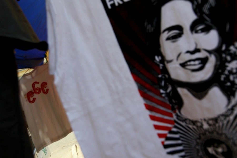 A 969 shirt is seen among National League for Democracy party shirts and Aung San Suu Kyi shirts at a shop on a street side in Yangon on April 27, 2013. (Soe Zeya Tun/Courtesy Reuters)