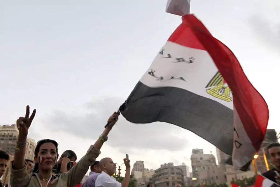 Opponents of ousted Egyptian president Mohamed Morsi celebrate in Alexandria on July 7 (Louafi Larbi/Courtesy Reuters).