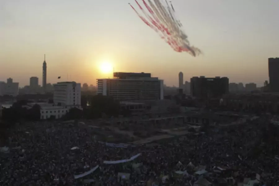 Egyptian military jets fly over Tahrir square as protesters who are against former Egyptian President Mohamed Mursi gather, in Cairo July 7, 2013. (Courtesy REUTERS/Amr Abdallah Dalsh)