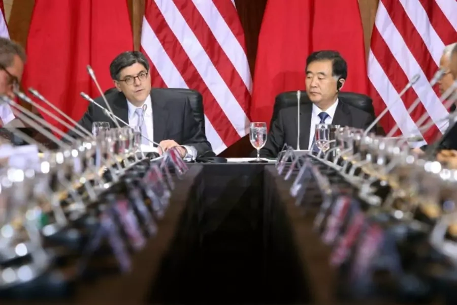 U.S. Treasury Secretary Jacob Lew (L) delivers remarks with China's Vice Premier Wang Yang at the U.S.-China Strategic and Economic Dialogue at the Treasury Department in Washington on July 10, 2013.