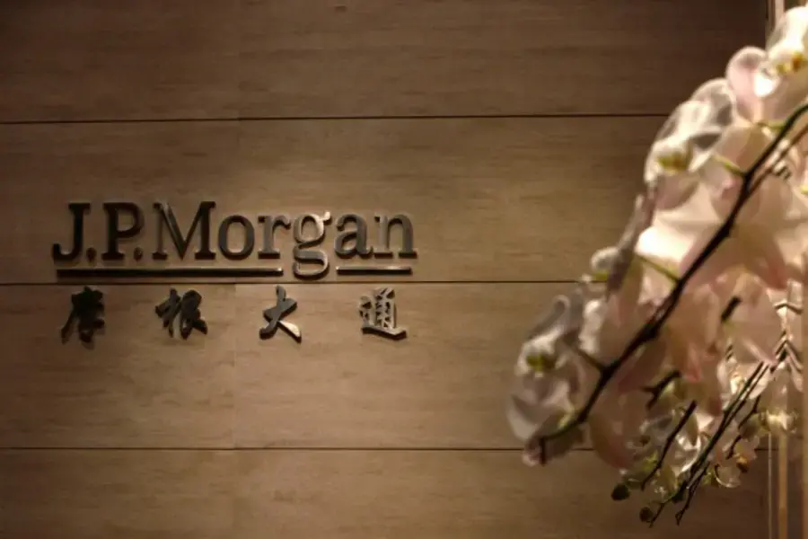 The JP Morgan sign is pictured at its Beijing office, in this picture taken December 13, 2010. A federal bribery investigation...ficials to help it win business is just the latest in a series of legal and regulatory headaches. (Jason Lee/Courtesy Reuters)
