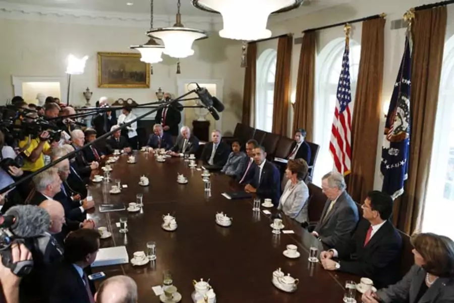 President Barack Obama discusses a military response to Syria with bipartisan Congressional leaders in the Cabinet Room at the White House (Larry Downing/Courtesy Reuters).