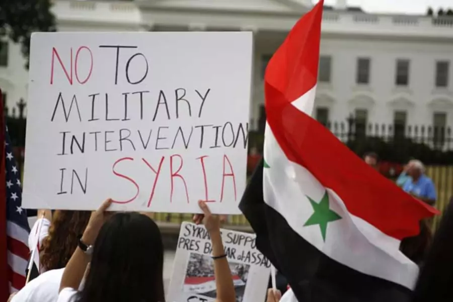 Syrian-American demonstrators protest in front of the White House (Jim Bourg/Courtesy Reuters).