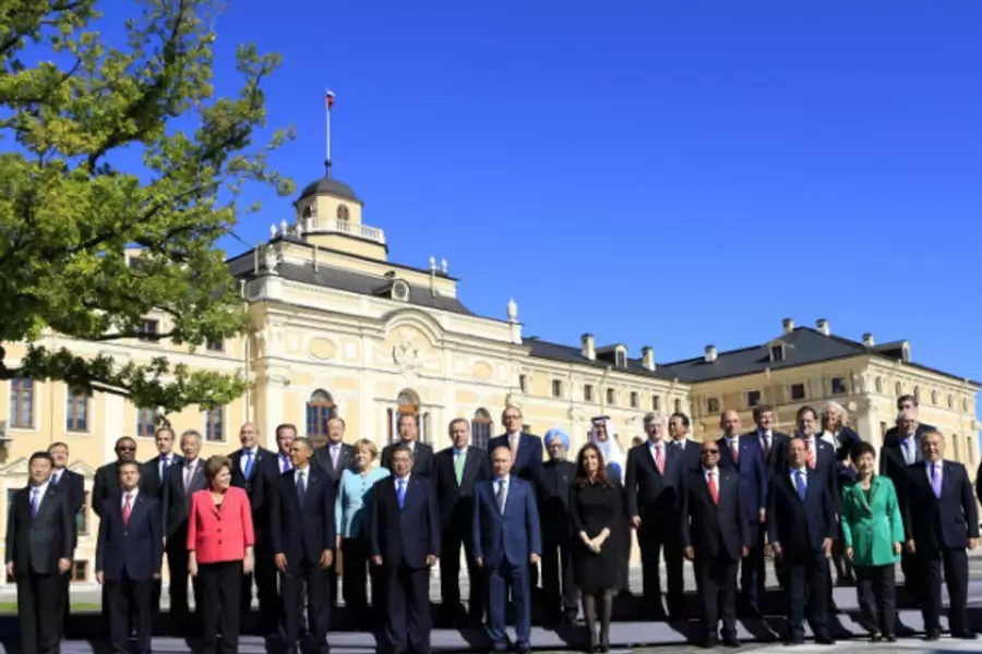 Leaders pose for a group photo at Constantine Palace during the G20 Summit in St. Petersburg (Kevin Lamarque/Courtesy Reuters)