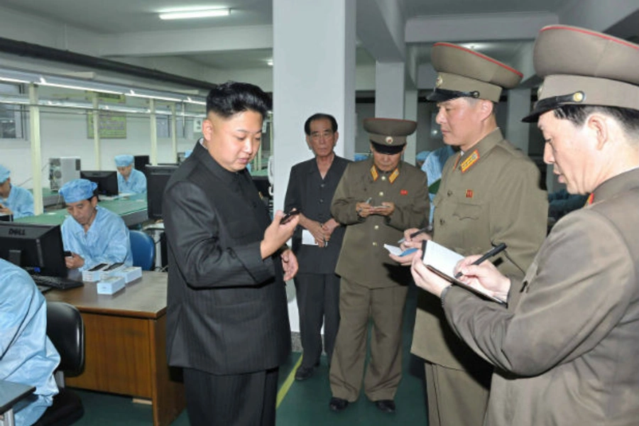 Kim Jong-un, here at the May 11 Factory, is taking a greater interest in economic reforms that may impact the international trade prospects for North Korea.