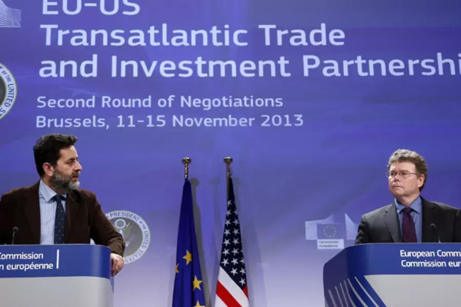 European Union chief negotiator Ignacio Garcia Bercero (left) and U.S. chief negotiator Dan Mullaney (right) address a joint n...otiations for Transatlantic Trade and Investment Partnership in Brussels November 15, 2013 (Francois Lenoir/Courtesy Reuters).