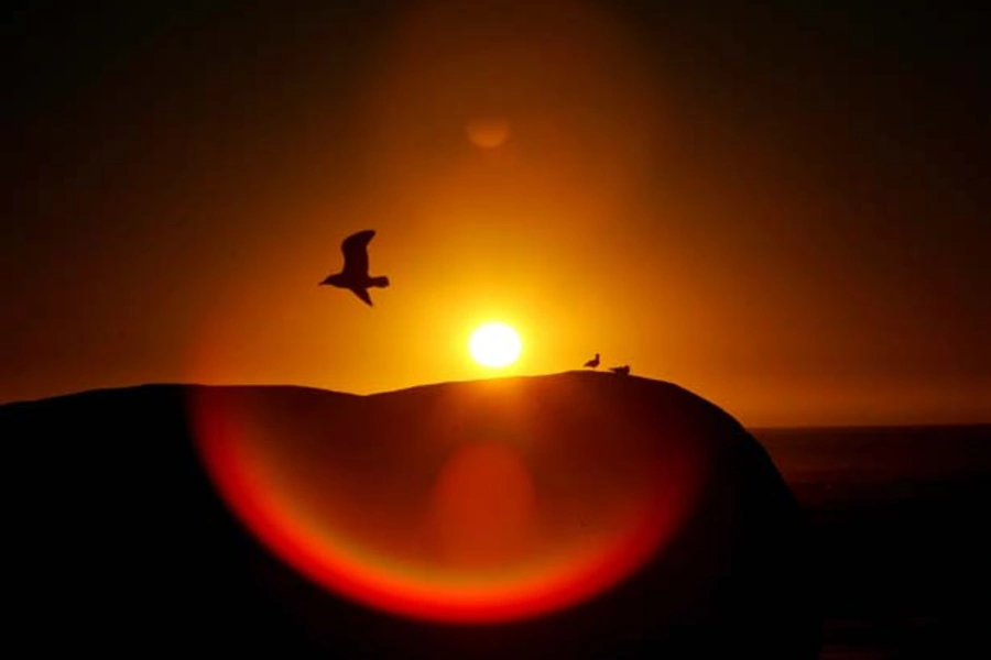 The sun sets over Clifton Beach in Cape Town, South Africa. (Mike Hutchings/Courtesy Reuters)