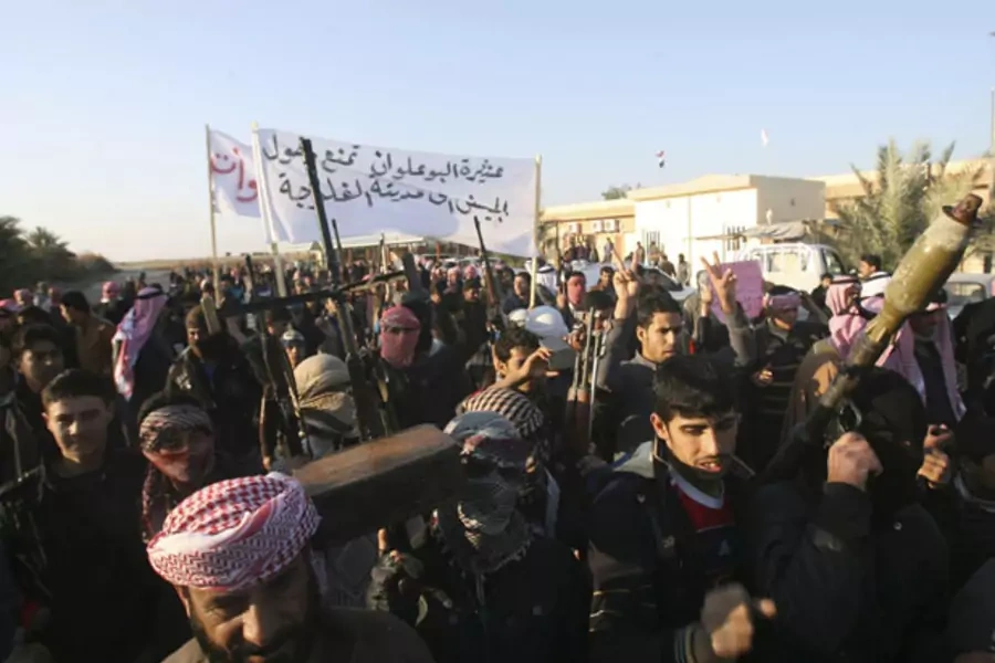 Sunni gunmen protest against Iraq's Shiite-led government in Fallujah on January 7, 2014. (Stringer/Courtesy Reuters)