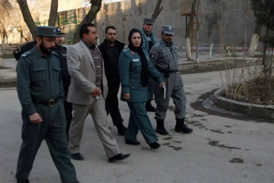 Colonel Jamila Bayaaz, the first female district police chief in Afghanistan, walks in Kabul, January 15, 2014 (Courtesy Reuters/Mohammad Ismail).