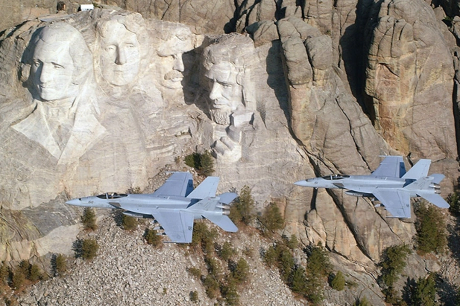 U.S. Navy F/A-18E Super Hornets fly by Mount Rushmore. (Lt. Anthony Dobson/U.S. Navy Handout/Courtesy Reuters)