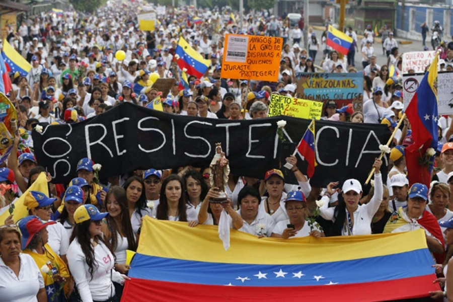 Demonstrators protest the Venezuelan government in San Cristobal, about 410 miles southwest of Caracas. (Carlos Garcia/Courtesy Reuters).