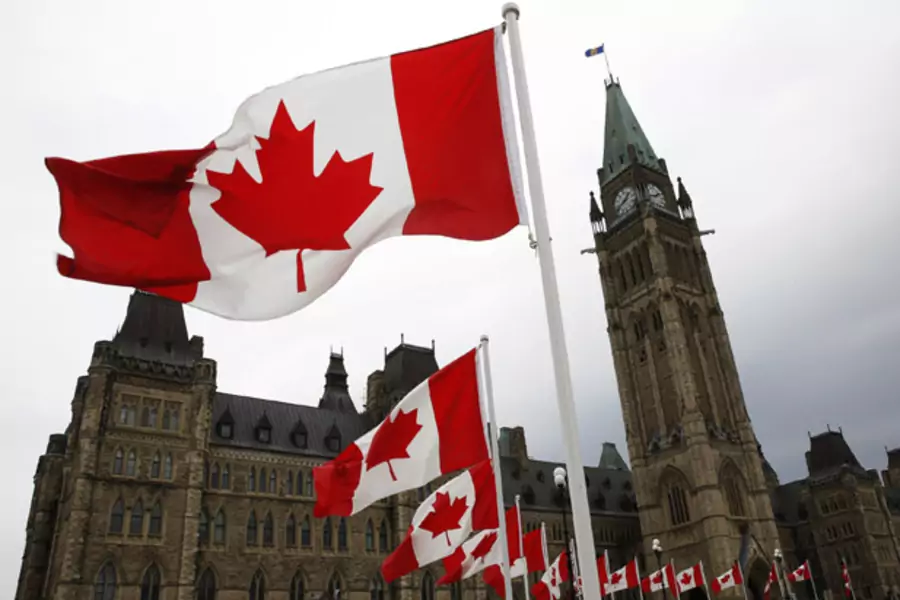 Canada flags Parliament Hill Ottawa