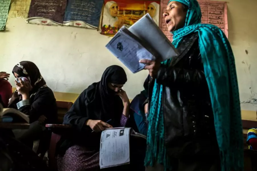 Afghan women take part in a literacy class at the Organisation of Promoting Afghan Women's Capabilities (OPAWC) center in Kabul, Afghanistan, March 2014 (Courtesy Reuters/Zohra Bensemra).