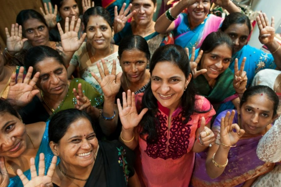 Varsha Mahendra, founder of DSGYN IDYS and Jus Blouses, works in her showroom and in the factory in Hyderabad, India, October 2012 (Courtesy Goldman Sachs).