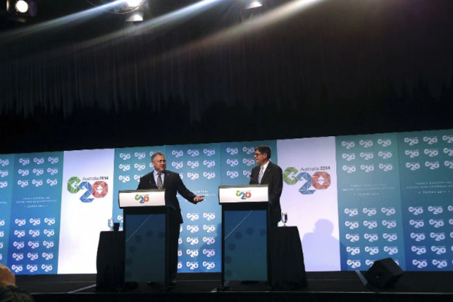 U.S. Treasury Secretary Jack Lew and his Australian counterpart Joe Hockey speak at a media conference at the G20 Finance Ministers and Central Bank Governors meeting in the Australian city of Cairns on September 19, 2014.