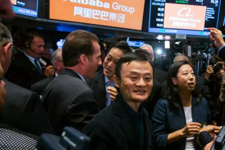 Alibaba Group Holding Ltd. founder Jack Ma greets traders at the New York Stock Exchange as he celebrates the company's initial public offering (IPO) under the ticker "BABA", in New York on September 19, 2014. (Lucas Jackson/Courtesy Reuters)