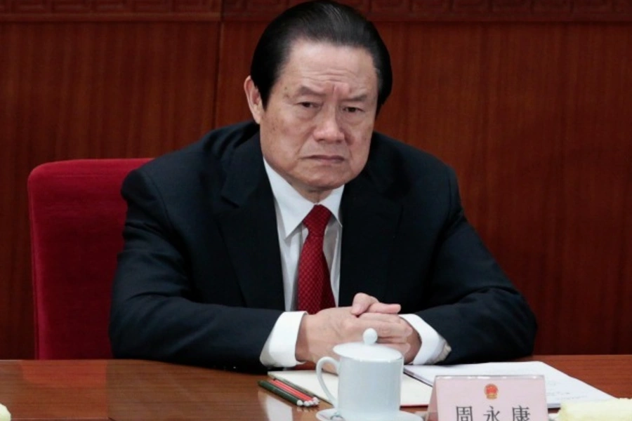 China's former Politburo Standing Committee Member Zhou Yongkang attends the closing ceremony of the National People's Congres...na Morning Post reported on August 30, 2013. Picture taken March 14, 2012. REUTERS/Jason Lee (CHINA - Tags: POLITICS BUSINESS)
