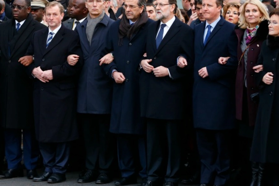 Heads of state including Britain's Prime Minister David Cameron (3rdR), Denmark's Prime Minister Helle Thorning Schmidt (2ndR)... attend the solidarity march (Marche Republicaine) in the streets of Paris on January 11, 2015. (Yves Herman/Courtesy Reuters)