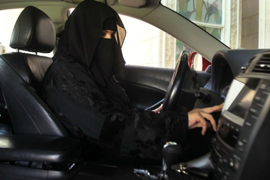 A woman drives a car in October 2013 in Saudi Arabia, the only country in the world where women are barred from driving. Saudi female activists are campaigning to change this rule (Courtesy Reuters/Faisal Al Nasser).