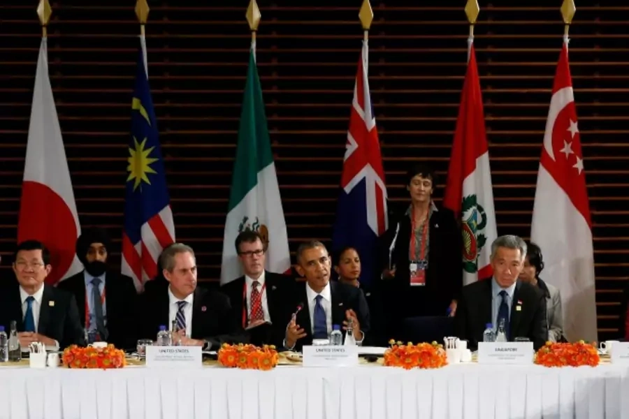 U.S. President Barack Obama (C) meets with the leaders of the Trans-Pacific Partnership (TPP) countries in Beijing November 10...so travel to Myanmar and Australia during his week-long trip to Asia. REUTERS/Kevin Lamarque (CHINA - Tags: POLITICS BUSINESS)