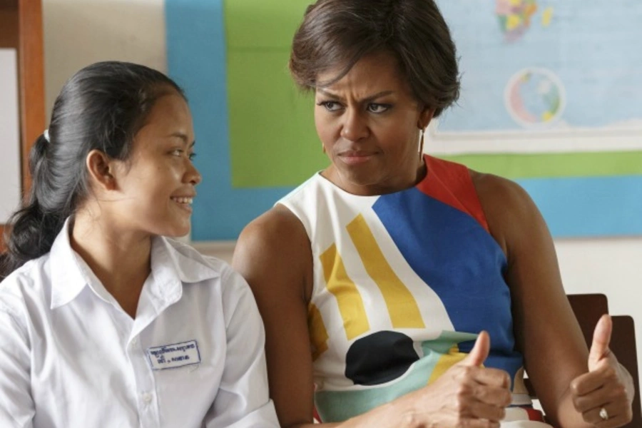 U.S. First Lady Michelle Obama gestures during a visit to promote girls' education and the “Let Girls Learn” initiative at Hun Sen Prasaat Bankong high school on the outskirts of Siem Reap, Cambodia, March 2015 (Courtesy Athit Perawongmetha/Reuters).