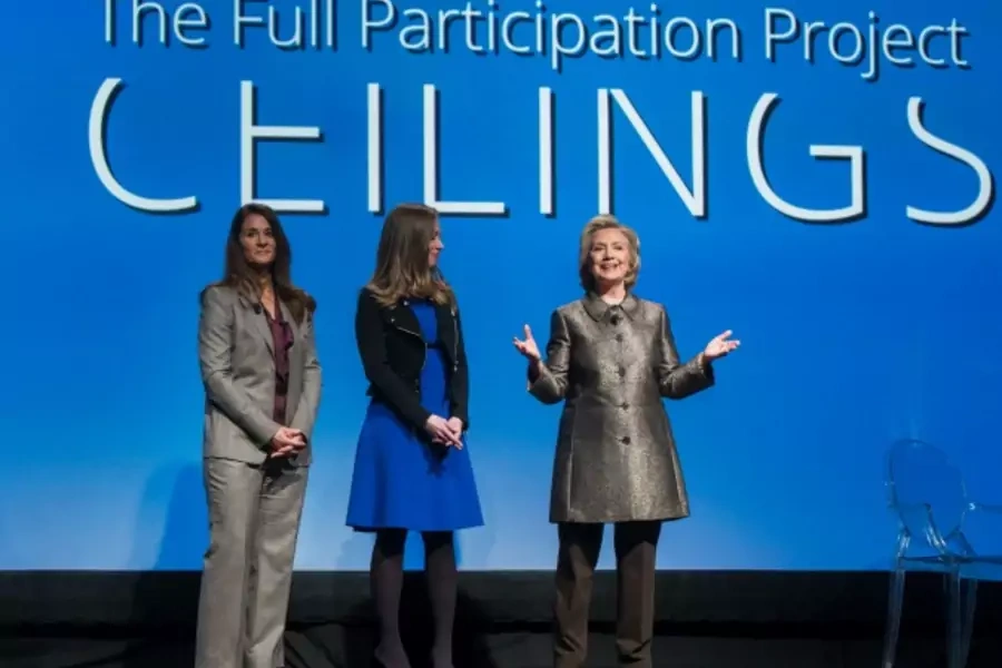 Former U.S. Secretary of State Hillary Clinton (R) speaks on-stage with her daughter, Chelsea Clinton, and Melinda Gates (L) a...inton Foundation’s "No Ceilings: The Full Participation Report" in New York, March 9, 2015 (Courtesy Reuters/Lucas Jackson).
