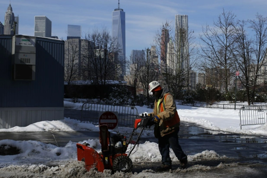 worker clean Brooklyn Bridge Park New York