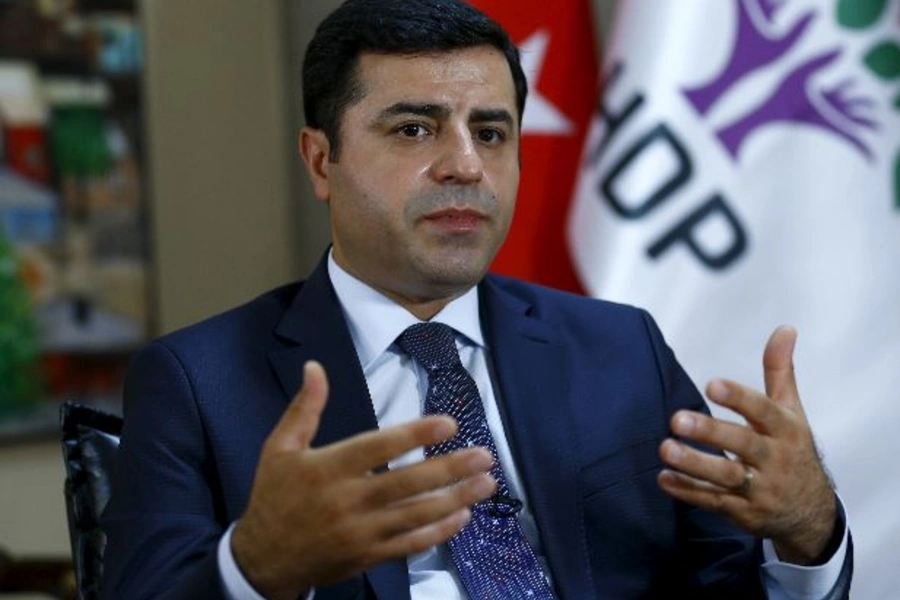 The leader of Turkey's pro-Kurdish opposition Peoples' Democratic Party (HDP) Selahattin Demirtas answers a question during an...n the HDP entered parliament as a party for the first time. To match Interview MIDEAST-CRISIS/TURKEY-KURDS REUTERS/Umit Bektas