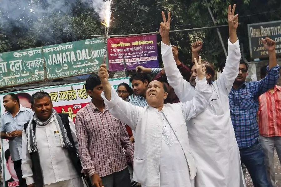 Supporters of Janata Dal (United) celebrate after learning the initial results outside the party office in New Delhi, India, N...sh his standing with foreign leaders amid concern he may not win a second term as prime minister (Reuters/Anindito Mukherjee).