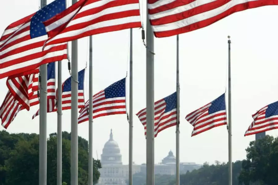 American flags fly at half-staff in Washington, D.C. (Larry Downing/Courtesy Reuters)