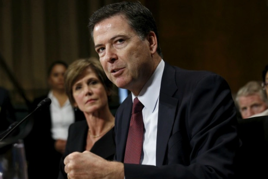 U.S. Deputy Attorney General Sally Quillian Yates (L) listens as FBI Director James Comey (R) speaks during a Senate Judiciary...ncryption, Technology, and the Balance Between Public Safety and Privacy" in Washington July 8, 2015. (Kevin Lamarque/Reuters)