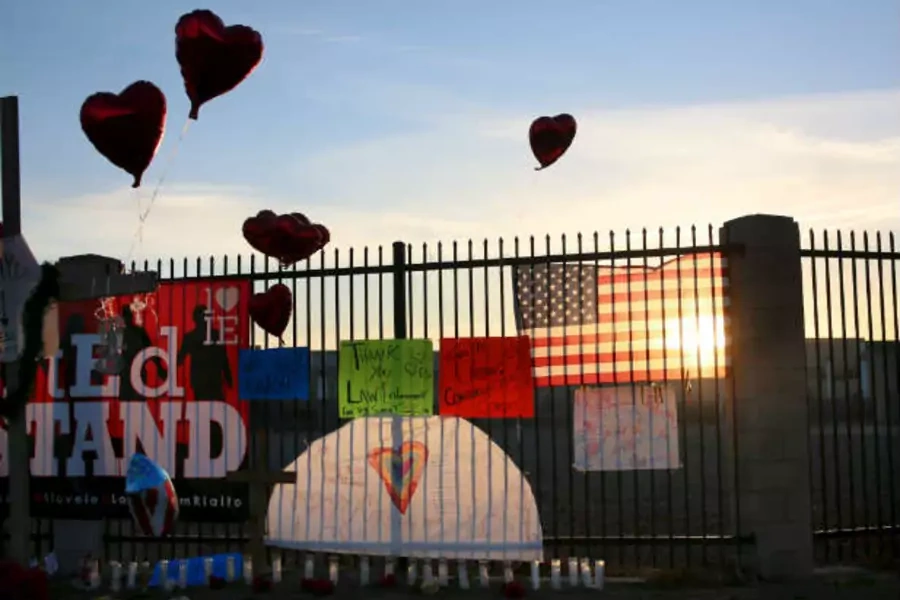 Mementos adorn a shrine to the victims of the San Bernardino attack. (Sandy Huffaker/Courtesy Reuters)