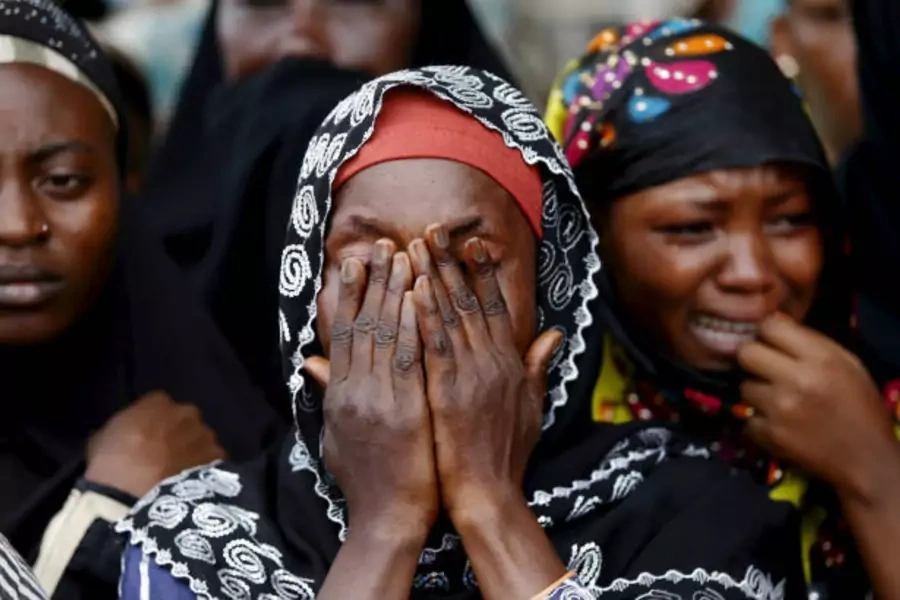 Women-cry-funeral-burundi-violence-conflict