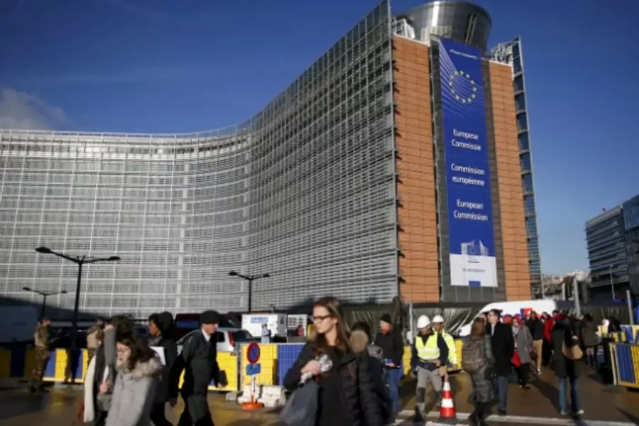 People walk outside the European Commission headquarters in Belgium, November 26, 2015. (Benoit Tessier/Reuters)