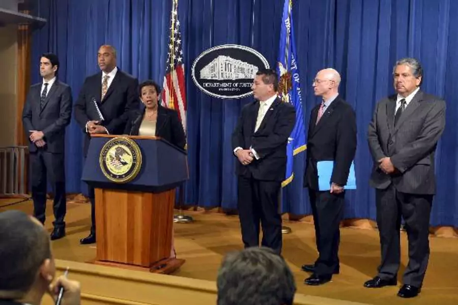 U.S. Attorney General Loretta Lynch (3rd L) makes remarks at a news conference to announce a law enforcement action relating t...redo Hawit and Juan Angel Napout have been arrested by Swiss authorities in the ongoing soccer scandal (Reuters/Mike Theiler).