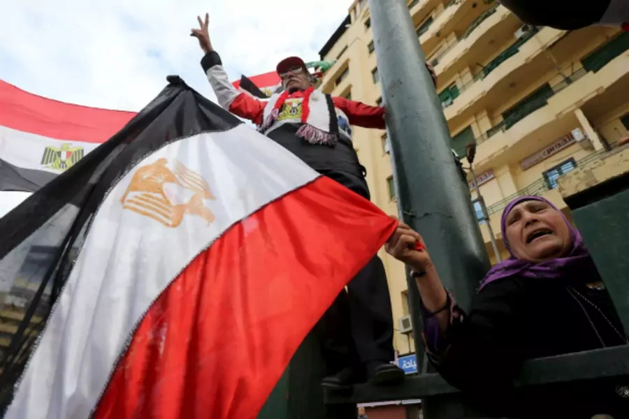 Egyptians celebrate on Tahrir Square during the fifth anniversary of the uprising that ended 30-year reign of Hosni Mubarak in Cairo, Egypt (Mohamed Abd El Ghany/Reuters).
