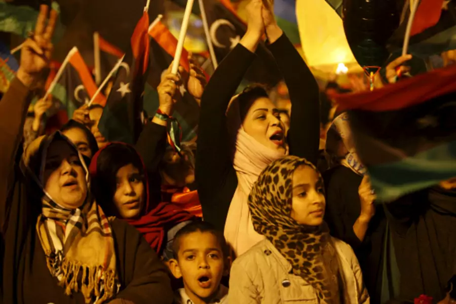 Libyans celebrate the fifth anniversary of the Libyan revolution, at Martyrs' Square in Tripoli (Ismail Zitouny/Reuters).