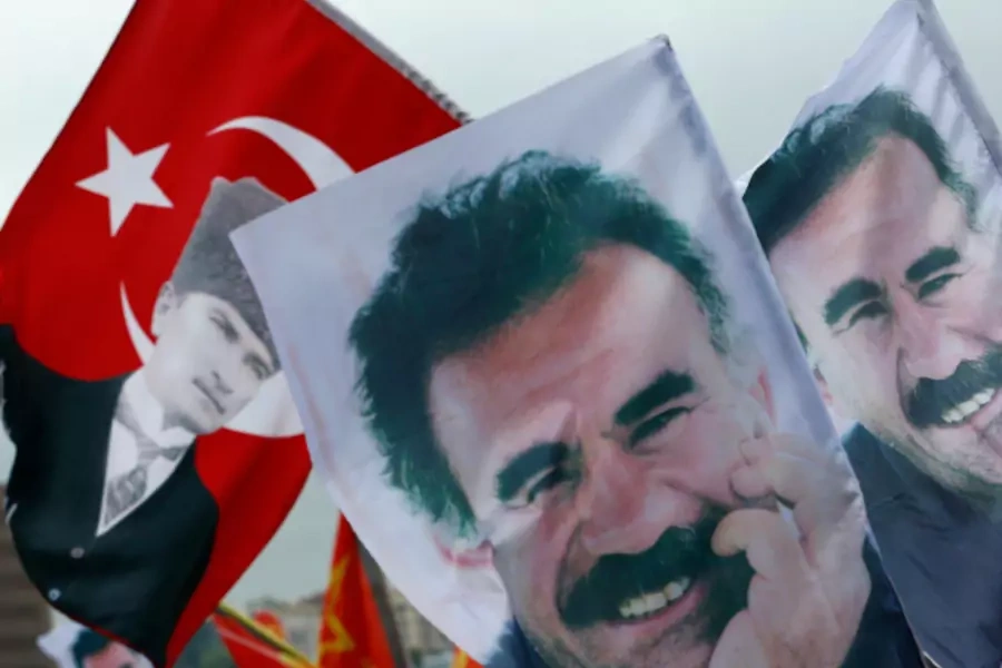 Flags with a picture of the jailed Kurdish militant leader Abdullah Ocalan and of modern Turkey's founder Mustafa Kemal Ataturk (L) are pictured during a gathering of supporters of the Pro-Kurdish Peoples' Democratic Party (HDP) (Murad Sezer/Reuters).