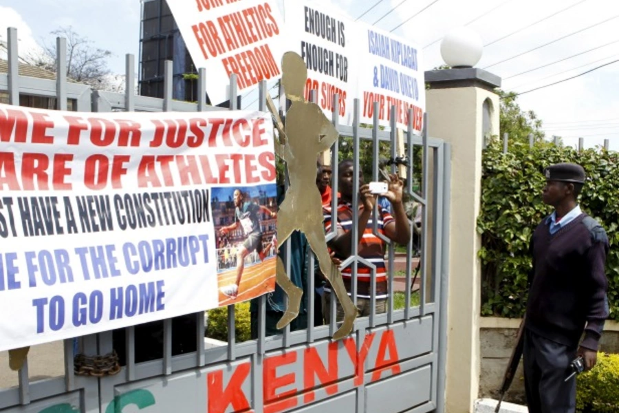 A policeman is seen outside the gates of Riadha House the Athletic Kenya (AK) Headquarters during a protest in capital Nairobi...ding that top Athletics Kenya (AK) bosses step down following allegations of graft and doping cover-ups (Reuters/Noor Khamis).