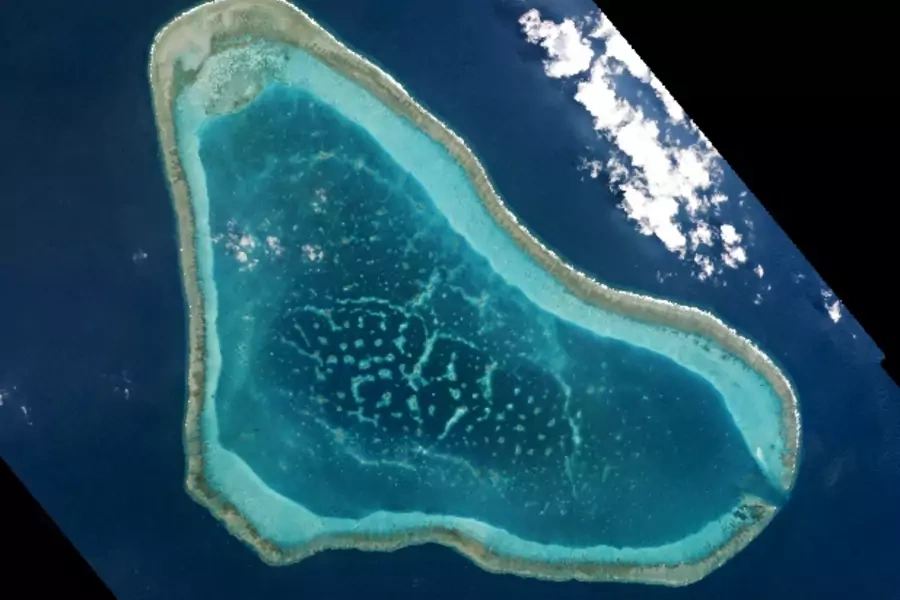 Boats at Scarborough Shoal in the South China Sea are shown in this handout photo provided by Planet Labs, and captured on Mar...LY. NOT FOR SALE FOR MARKETING OR ADVERTISING CAMPAIGNS. FOR EDITORIAL USE ONLY. NO RESALES. NO ARCHIVE. TPX IMAGES OF THE DAY