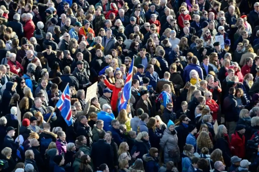 People demonstrate against Iceland's Prime Minister Sigmundur Gunnlaugsson in Reykjavik, Iceland on April 4, 2016 after a leak...his wife owning a tax haven-based company with large claims on the country's collapsed banks (Reuters/Stigtryggur Johannsson).