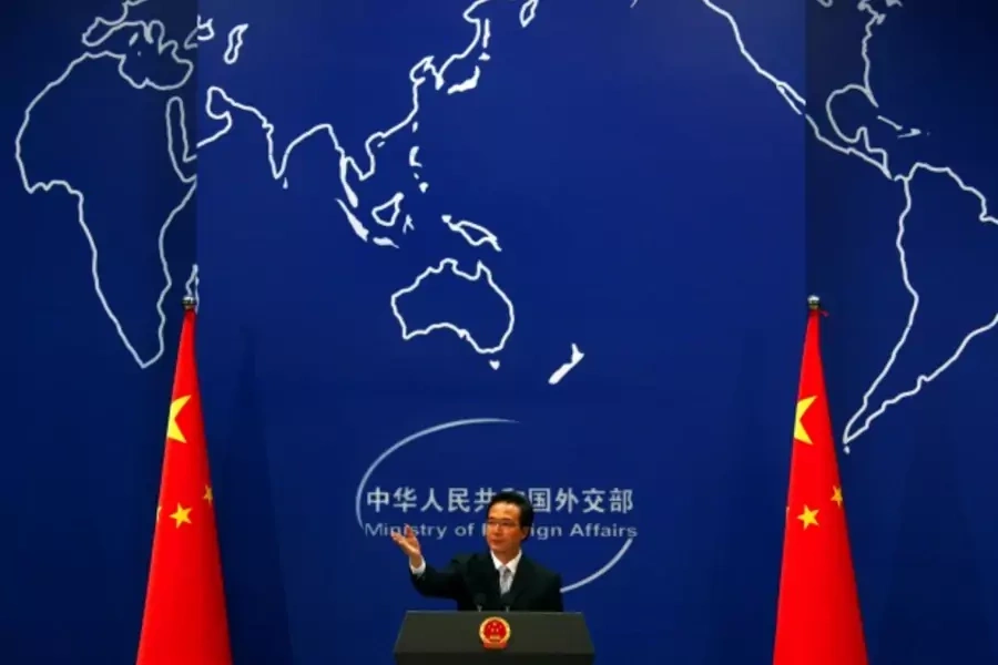 China's Foreign Ministry spokesman Hong Lei asks journalists for questions during a news conference in Beijing July 7, 2011. Hong largely avoided commenting on U.S. claims that online censorship is a barrier to trade. (David Gray/Reuters)