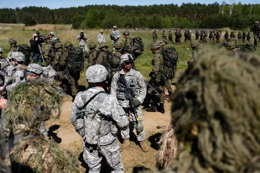 Paratroopers from the U.S. Army's 173rd Infantry Brigade Combat Team participate in training exercises with the Polish 6 Airborne Brigade soldiers at the Land Forces Training Centre in Oleszno near Drawsko Pomorskie, north west Poland on May 1, 2014.