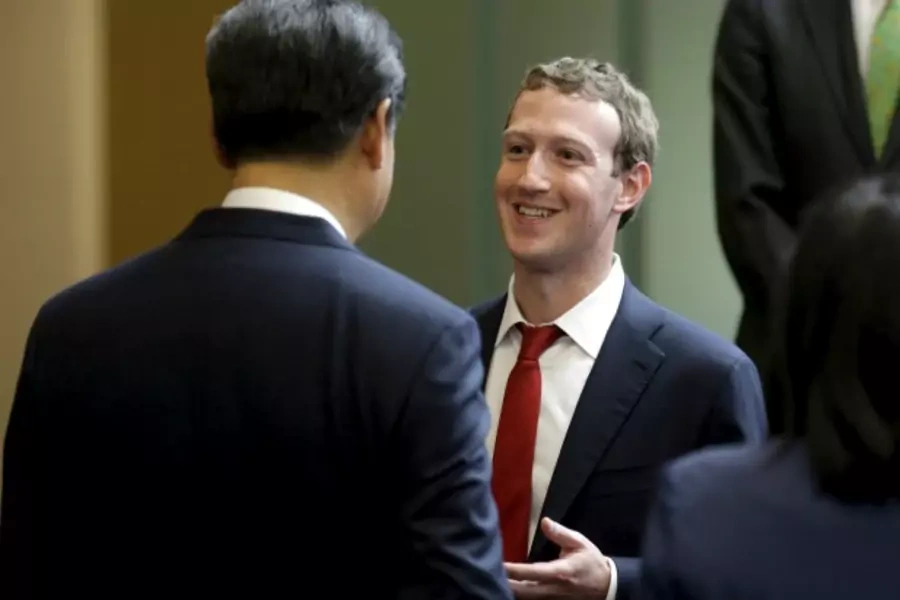 Chinese Communist Party General Secretary Xi Jinping (L) talks with Facebook founder Mark Zuckerberg during a gathering of tech executives at Microsoft's main campus, September 23, 2015. (Ted S. Warren/Reuters)