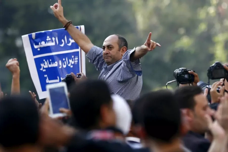 Khaled Ali shouts slogans against President Abdel Fattah al-Sisi and the government during a demonstration protesting the decision to transfer two Red Sea islands to Saudi Arabia (Amr Abdallah Dalsh/Reuters).